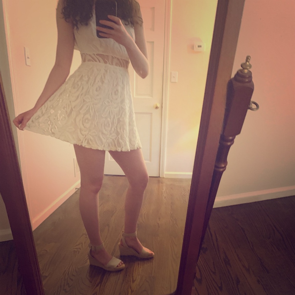 White lace dress with waist cutout